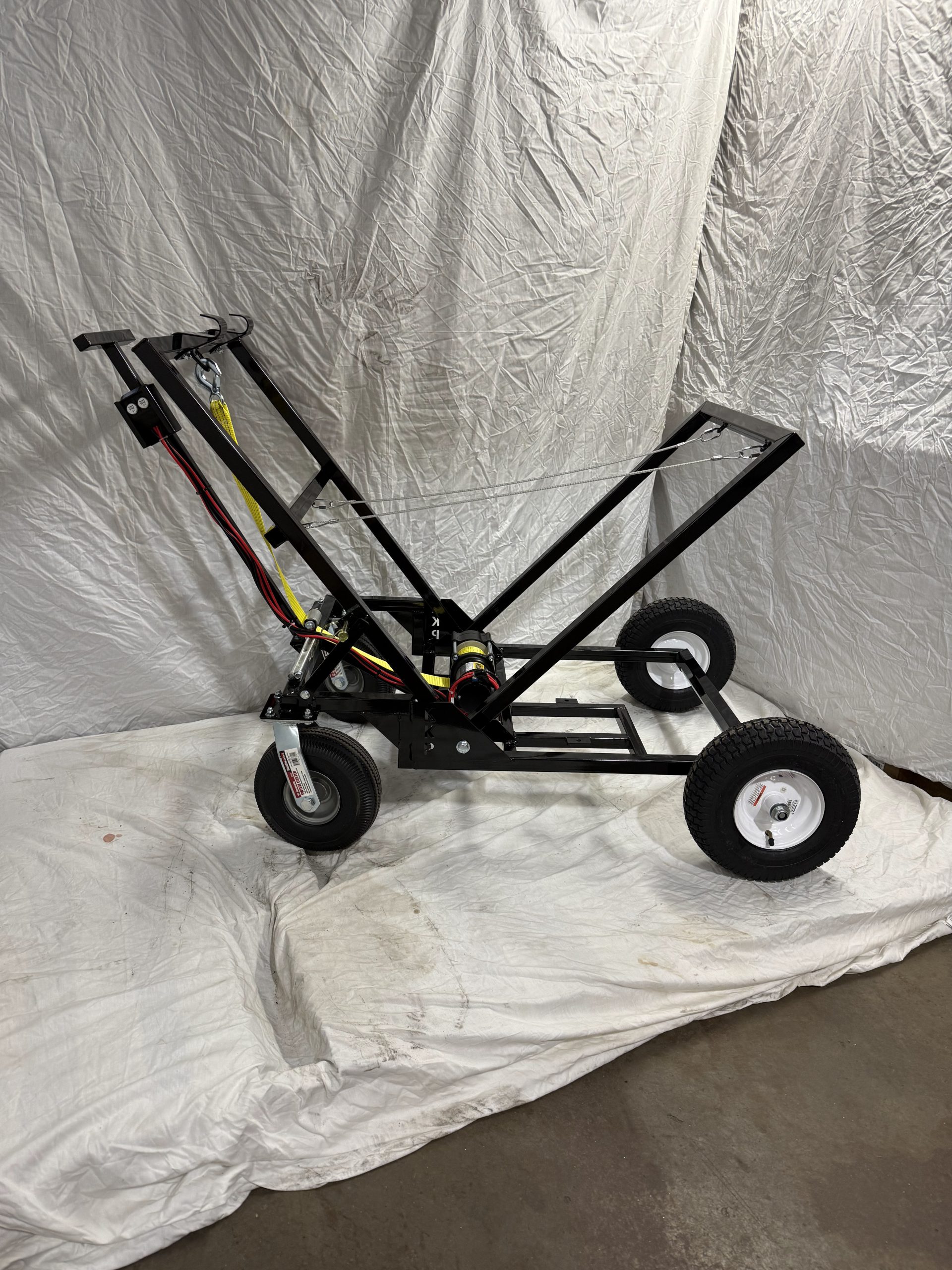 ONE MAN STAND WITH BIG WHEELS